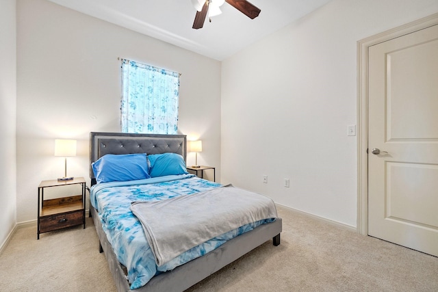 2107 54th St, Galveston, TX 77551 - bedroom with carpet flooring, baseboards, and ceiling fan