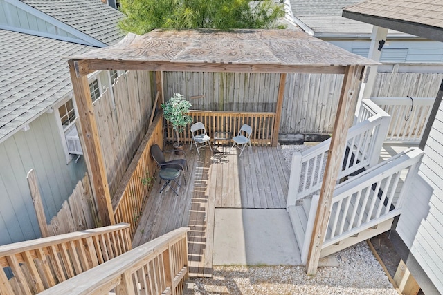 2107 54th St, Galveston, TX 77551 - wooden deck with fence