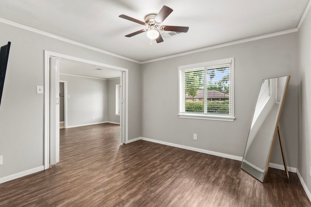 211 Cedar Ln, El Lago, TX 77586 - unfurnished room featuring dark wood-style flooring, a ceiling fan, baseboards, and ornamental molding