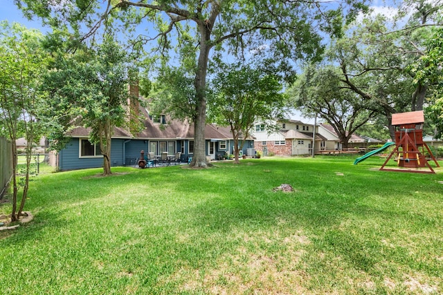 211 Cedar Ln, El Lago, TX 77586 - view of yard featuring a playground