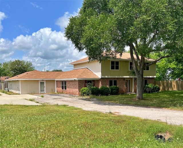 3811 Empress Ln, Richmond, TX 77406 - view of front of home featuring brick siding and driveway