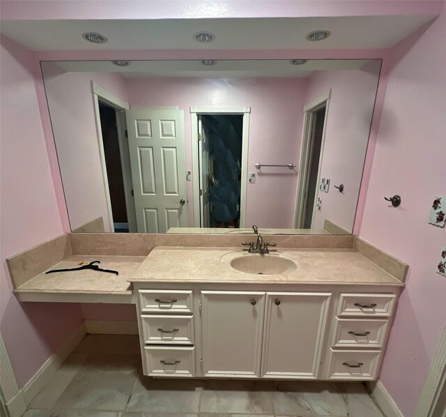 3811 Empress Ln, Richmond, TX 77406 - bathroom featuring baseboards and vanity