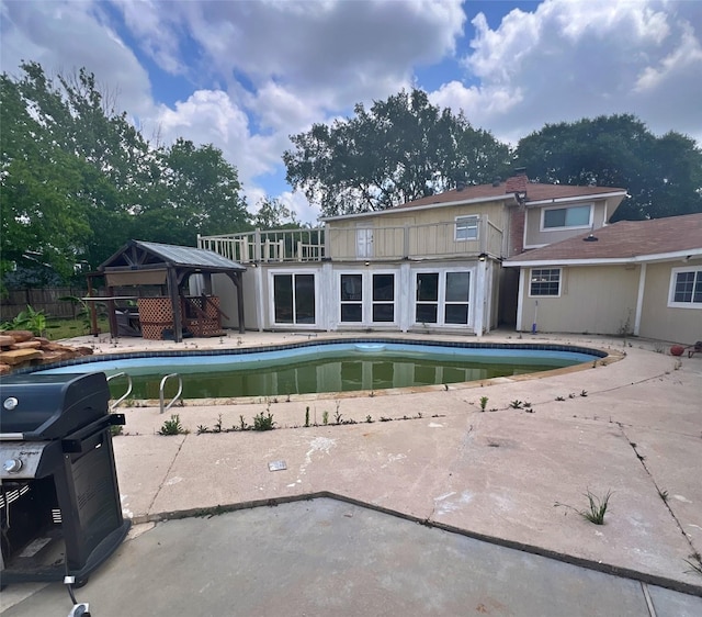 3811 Empress Ln, Richmond, TX 77406 - view of pool featuring a gazebo, a patio, and grilling area