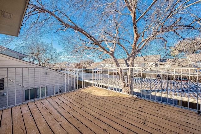 9393 Westwood Village Dr Unit 64, Houston, TX 77036 - wooden terrace featuring a residential view