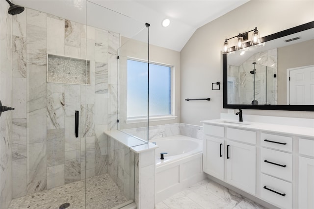 3804 Park Wood Dr, Corinth, TX 76208 - bathroom with marble look tile flooring, a marble finish shower, a garden tub, lofted ceiling, and vanity