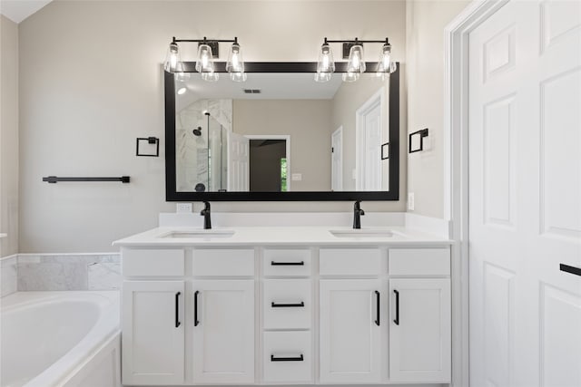 3804 Park Wood Dr, Corinth, TX 76208 - bathroom with a shower stall, a garden tub, and double vanity