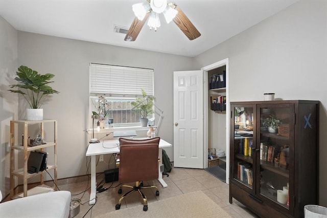3522 Plymouth Pointe Ln, Missouri City, TX 77459 - office area with a ceiling fan and light tile patterned flooring