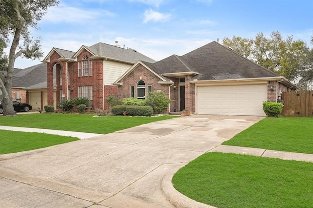 3522 Plymouth Pointe Ln, Missouri City, TX 77459 - traditional-style home featuring brick siding, an attached garage, driveway, and roof with shingles