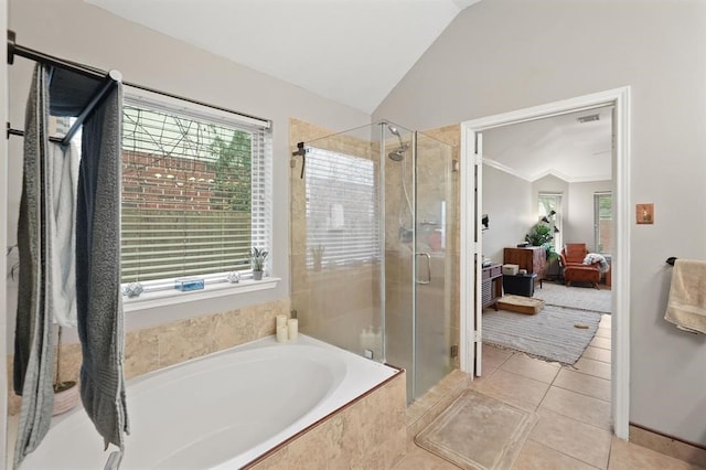 3522 Plymouth Pointe Ln, Missouri City, TX 77459 - ensuite bathroom with lofted ceiling, a stall shower, a bath, and tile patterned flooring