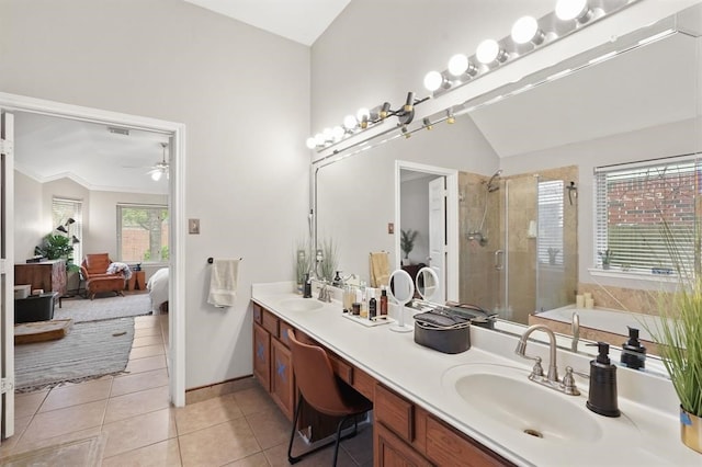 3522 Plymouth Pointe Ln, Missouri City, TX 77459 - bathroom with vaulted ceiling, ceiling fan, a shower stall, tile patterned flooring, and double vanity
