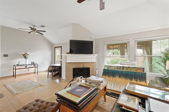 3522 Plymouth Pointe Ln, Missouri City, TX 77459 - living area with a ceiling fan, vaulted ceiling, light tile patterned floors, a fireplace, and baseboards