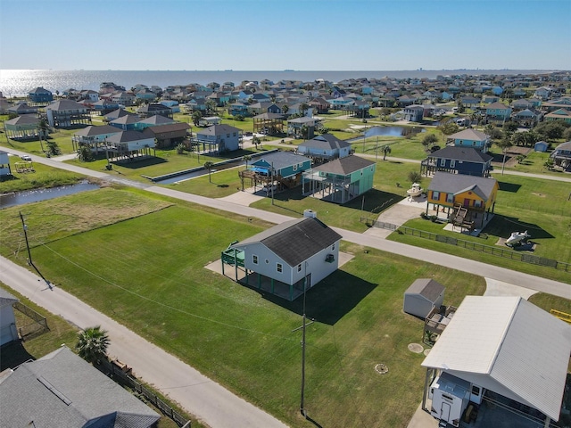 908 W Ln, Crystal Beach, TX 77650 - aerial view of residential area featuring a large body of water