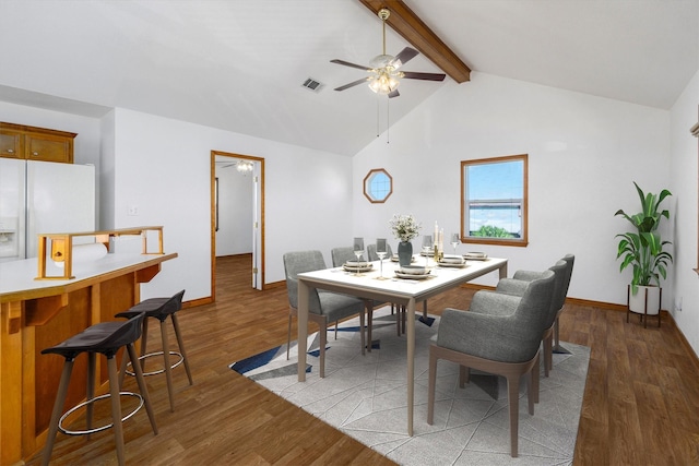 908 W Ln, Crystal Beach, TX 77650 - dining space with ceiling fan, wood finished floors, and baseboards