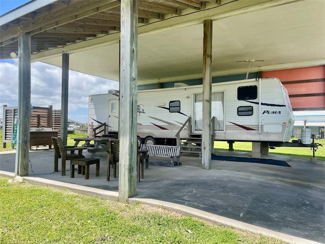 1139 Diamond Rd, Crystal Beach, TX 77650 - view of vehicle parking featuring entry steps and a carport
