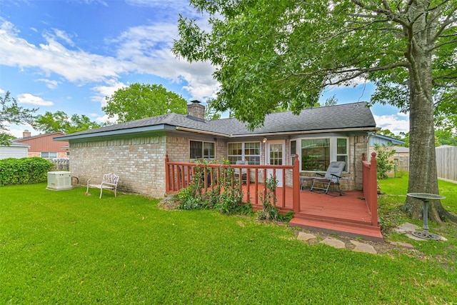 711 Seacliff Dr, Houston, TX 77062 - back of house with a wooden deck, a chimney, stone siding, brick siding, and a shingled roof