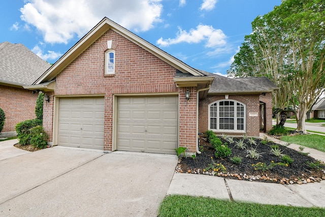13702 Senca Park Dr, Houston, TX 77077 - view of front of home featuring brick siding, driveway, a garage, and roof with shingles
