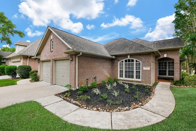 13702 Senca Park Dr, Houston, TX 77077 - view of front of house featuring brick siding, driveway, a shingled roof, and an attached garage
