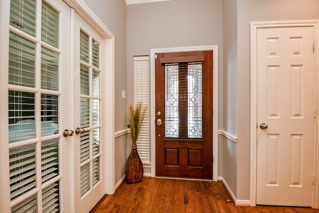 13702 Senca Park Dr, Houston, TX 77077 - foyer with baseboards, dark wood finished floors, and plenty of natural light
