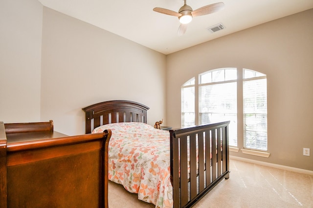13702 Senca Park Dr, Houston, TX 77077 - bedroom featuring light colored carpet, baseboards, and ceiling fan