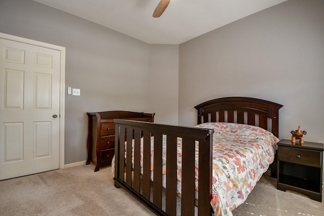 13702 Senca Park Dr, Houston, TX 77077 - carpeted bedroom with ceiling fan and baseboards