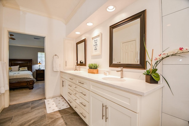 13702 Senca Park Dr, Houston, TX 77077 - bathroom with crown molding, double vanity, connected bathroom, and recessed lighting
