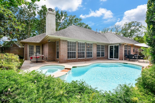 13702 Senca Park Dr, Houston, TX 77077 - rear view of property with a patio area, brick siding, a chimney, and fence