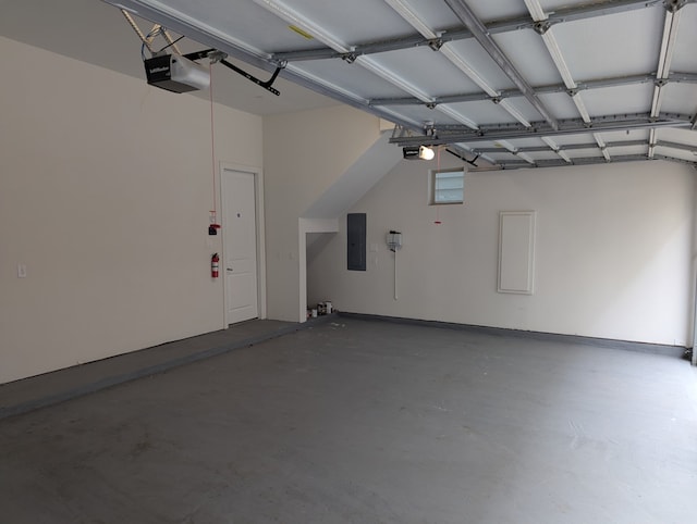 1505 Missouri St, Houston, TX 77006 - garage featuring electric panel and a garage door opener