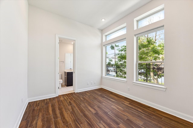1505 Missouri St, Houston, TX 77006 - unfurnished room featuring wood finished floors and baseboards