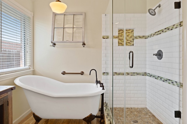 19030 Piney Way Dr, Tomball, TX 77375 - bathroom featuring a stall shower, a freestanding bath, vanity, and wood finished floors