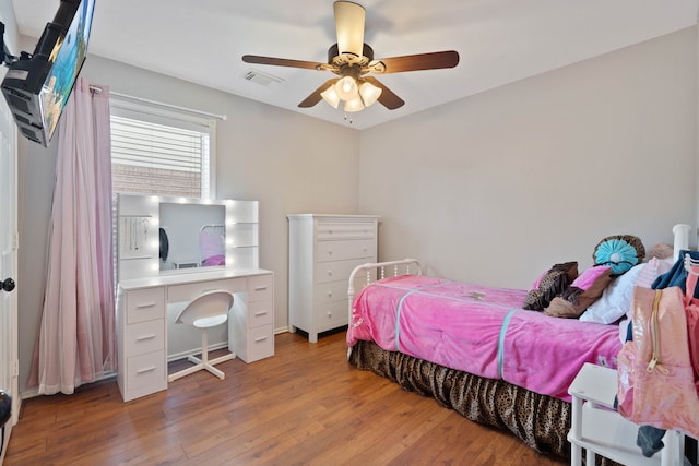 19030 Piney Way Dr, Tomball, TX 77375 - bedroom with light wood-style floors and ceiling fan
