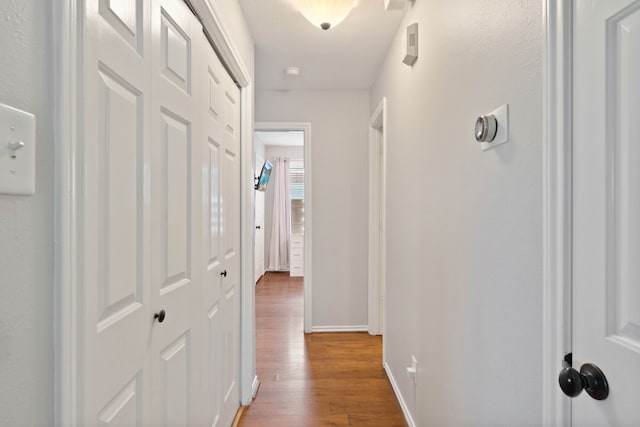 19030 Piney Way Dr, Tomball, TX 77375 - hall featuring wood finished floors and baseboards