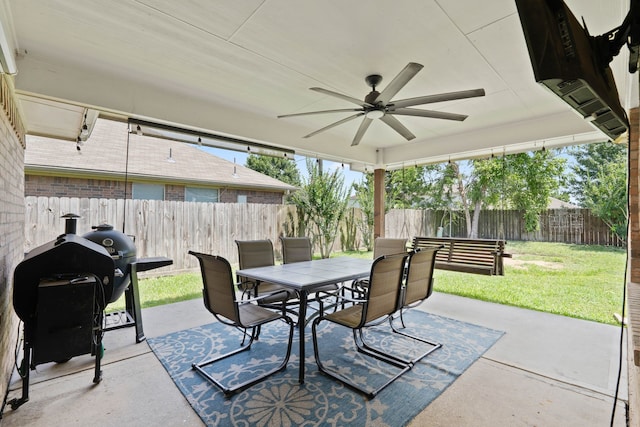 19030 Piney Way Dr, Tomball, TX 77375 - view of patio / terrace featuring ceiling fan, a grill, and outdoor dining area
