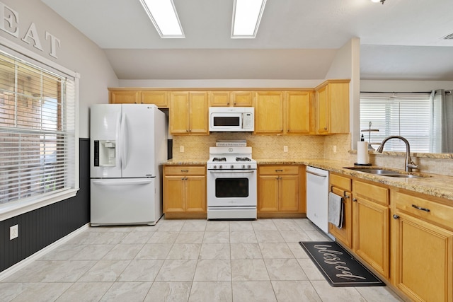 19030 Piney Way Dr, Tomball, TX 77375 - kitchen featuring white appliances, a sink, lofted ceiling, healthy amount of natural light, and decorative backsplash