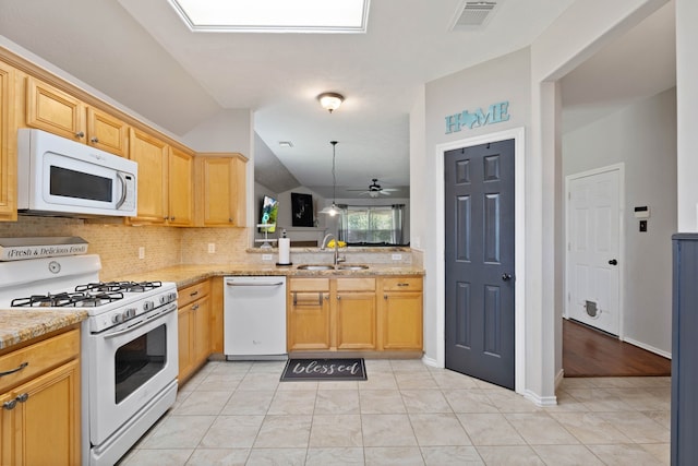 19030 Piney Way Dr, Tomball, TX 77375 - kitchen with white appliances, a sink, decorative backsplash, a ceiling fan, and light stone countertops
