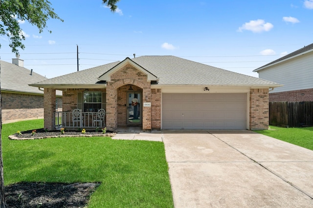 19030 Piney Way Dr, Tomball, TX 77375 - view of front of house with brick siding, roof with shingles, concrete driveway, a garage, and covered porch