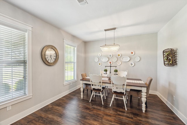 1170 Woody Ln, Sealy, TX 77474 - dining room with baseboards and dark wood-style floors