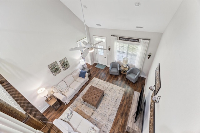 1170 Woody Ln, Sealy, TX 77474 - living room featuring vaulted ceiling, wood finished floors, baseboards, and a ceiling fan