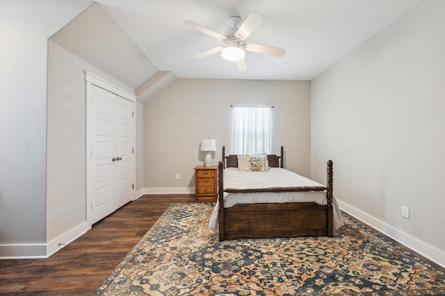 1170 Woody Ln, Sealy, TX 77474 - bedroom with dark wood-type flooring, baseboards, ceiling fan, and lofted ceiling
