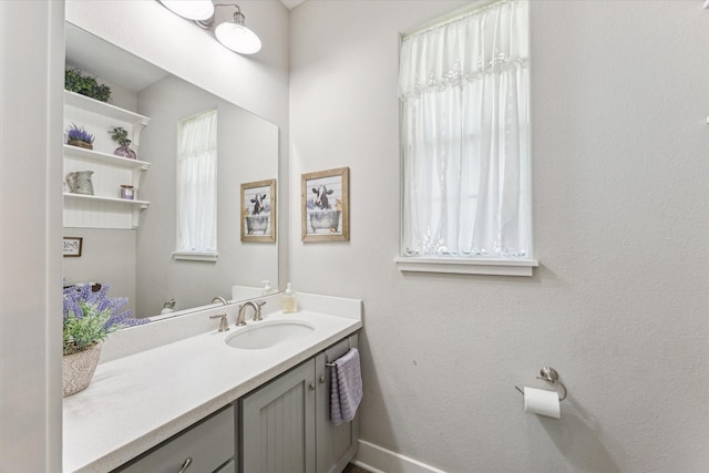 1170 Woody Ln, Sealy, TX 77474 - bathroom with vanity and baseboards