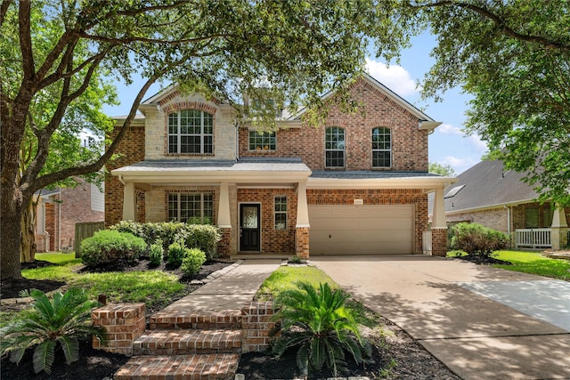 12314 Shore Lands Rd, Cypress, TX 77433 - traditional-style home featuring an attached garage, brick siding, and driveway