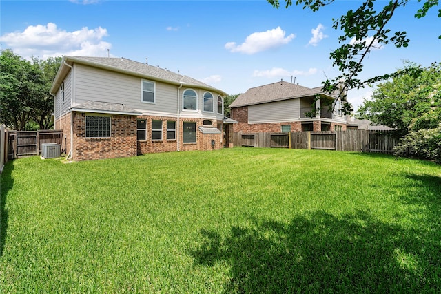 12314 Shore Lands Rd, Cypress, TX 77433 - back of house with central AC unit and brick siding