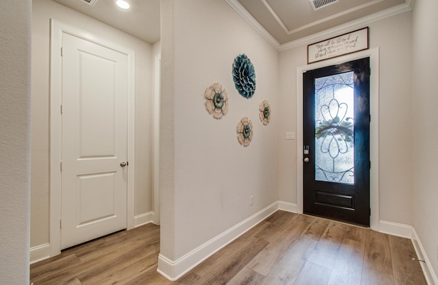 10014 Knollwood Ln, Missouri City, TX 77459 - foyer with light wood-style floors, ornamental molding, and baseboards