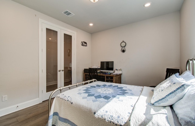 10014 Knollwood Ln, Missouri City, TX 77459 - bedroom with french doors, wood finished floors, recessed lighting, and baseboards