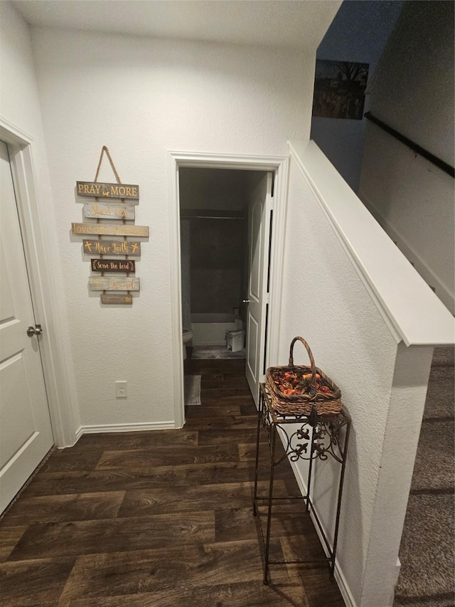 21303 Riverdew Dr, Katy, TX 77449 - hallway with dark wood-style floors and baseboards