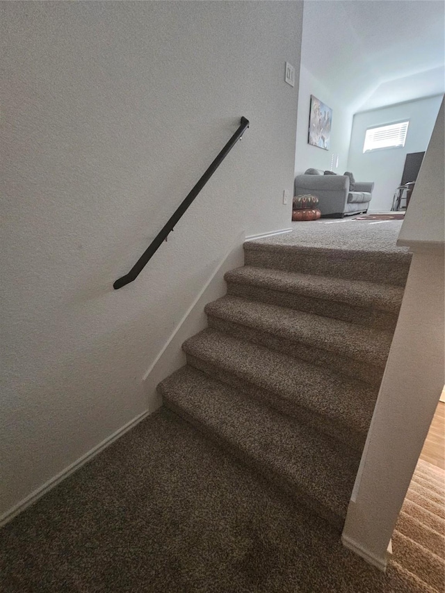21303 Riverdew Dr, Katy, TX 77449 - stairs featuring vaulted ceiling and carpet floors