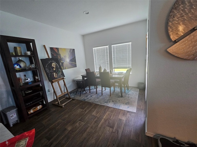 21303 Riverdew Dr, Katy, TX 77449 - dining area featuring dark wood-style flooring and baseboards