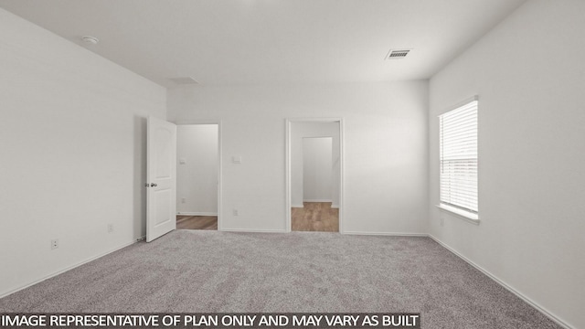 534 Belle Springs Ln, Conroe, TX 77301 - unfurnished bedroom with carpet flooring and baseboards
