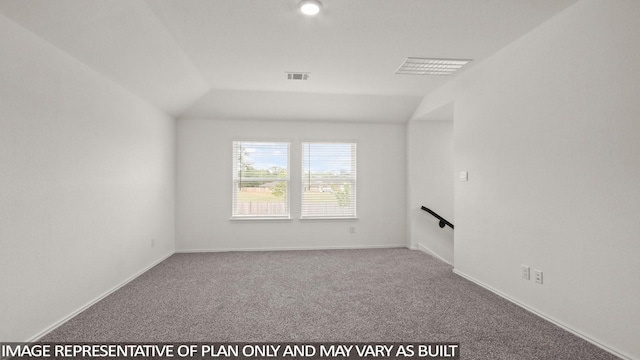 534 Belle Springs Ln, Conroe, TX 77301 - carpeted empty room featuring vaulted ceiling and baseboards