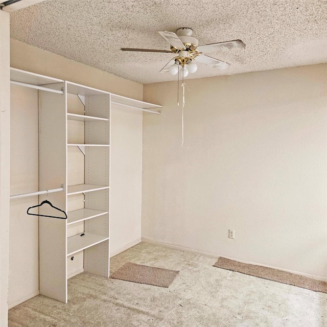 2325 Crescent Park Dr Unit 277, Houston, TX 77077 - walk in closet featuring a ceiling fan and carpet floors
