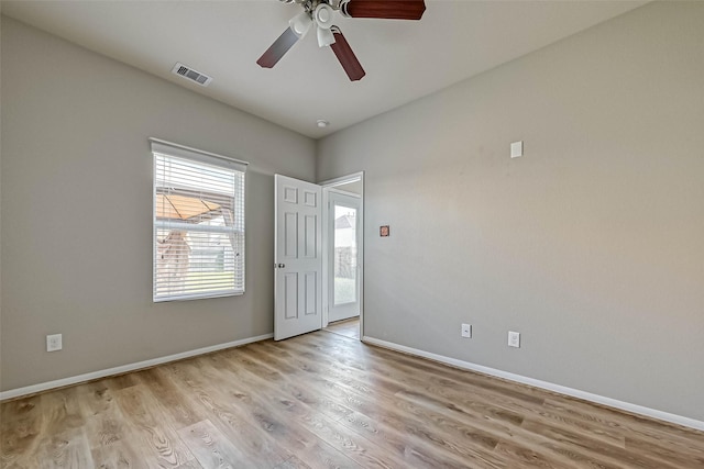 5006 Forest Hurst Gln, Spring, TX 77373 - empty room featuring light wood-style flooring, baseboards, and ceiling fan